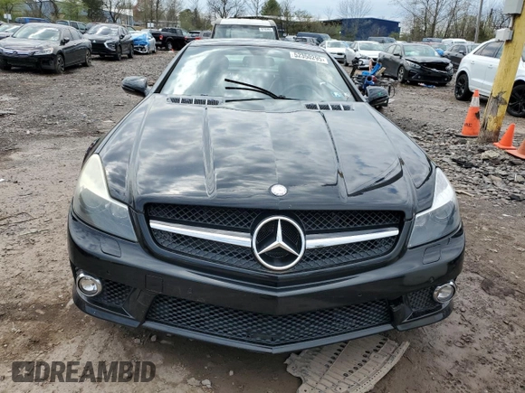 2009 Mercedes-Benz SL 55/63 AMG with VIN WDBSK70F79F157839, listed as a Copart auction lot 52350295 with 79,670 mi miles and Salvage title. Bid and sale history available at DreamBid. Image 5.