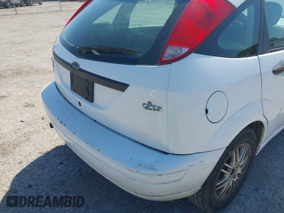2005 Ford Focus S with VIN 3FAFP37N55R142740, listed as a IAAI auction lot 42052407 with 194,660 mi miles and . Bid and sale history available at carsss.com. Image 12.