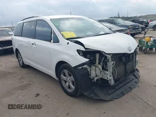 2014 Toyota Sienna LE AAS with VIN 5TDKK3DC6ES526159, listed as a IAAI auction lot 41522210 with 123,563 mi miles and . Bid and sale history available at DreamBid. Image 1.