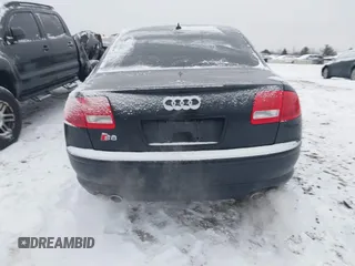 2007 Audi S8 z VIN WAUPN44E67N009650, wystawiony jako IAAI lot #41341680 z przebiegiem 166 611 mil mil oraz . Historia ofert i sprzedaży dostępna na DreamBid. Obrazek 16.