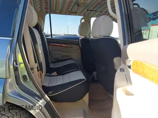 2005 Lexus GX 470 z VIN JTJBT20X650076884, wystawiony jako IAAI lot #41776915 z przebiegiem 219 091 mil mil oraz . Historia ofert i sprzedaży dostępna na DreamBid. Obrazek 8.