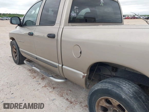 2002 Dodge 1500 z VIN 3D7HA18N32G165731, wystawiony jako IAAI lot #42074127 z przebiegiem 179 089 mil mil oraz . Historia ofert i sprzedaży dostępna na DreamBid. Obrazek 6.
