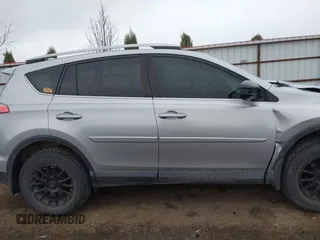 2018 Toyota RAV4 LE with VIN 2T3BFREV9JW724606, listed as a IAAI auction lot 41862028 with 98,590 mi miles. Bid and sale history available at carsss.com. Image 13.