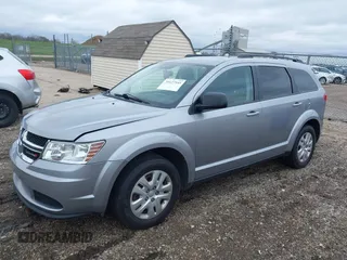 2016 Dodge Journey SE with VIN 3C4PDCAB4GT230643, listed as a IAAI auction lot 39127555 with 102,756 mi miles. Bid and sale history available at carsss.com. Image 2.