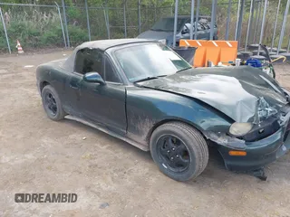 1999 Mazda MX-5 Miata z VIN JM1NB3531X0105029, wystawiony jako IAAI lot #42083930 z przebiegiem 186 885 mil mil oraz . Historia ofert i sprzedaży dostępna na DreamBid. Obrazek 1.
