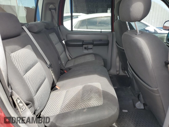 2003 Ford Explorer Sport Trac XLS z VIN 1FMZU67EX3UA71831, wystawiony jako Copart lot #57167025 z przebiegiem 145 290 mil mil oraz Szkoda całkowita • Salvage title. Historia ofert i sprzedaży dostępna na DreamBid. Obrazek 11.