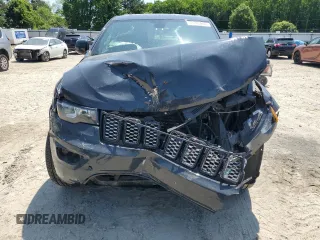 2018 Jeep Grand Cherokee Altitude with VIN 1C4RJFAGXJC267021, listed as a Copart auction lot 58762945 with 93,347 mi miles and Salvage title. Bid and sale history available at DreamBid. Image 5.
