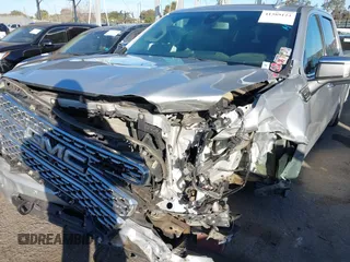 2019 GMC Sierra 1500 SLT z VIN 3GTP8DED8KG224724, wystawiony jako IAAI lot #41389124 z przebiegiem 118 106 mil mil oraz . Historia ofert i sprzedaży dostępna na DreamBid. Obrazek 6.