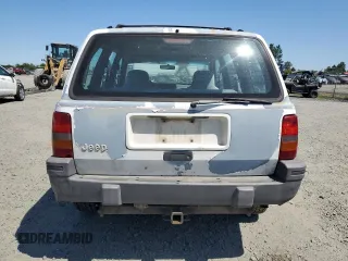 1993 Jeep Grand Cherokee Laredo с VIN 1J4GZ58S2PC654248, выставлен на аукционе Copart как лот 61259735 с пробегом 251 360 миль миль и Списание • Salvage title. История ставок и продаж доступна на DreamBid. Изображение 6.