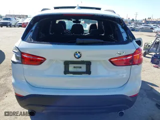 2016 BMW X1 xDrive28i with VIN WBXHT3C32G5E51855, listed as a IAAI auction lot 41634237 with 69,101 mi miles. Bid and sale history available at carsss.com. Image 15.