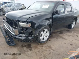 2011 Honda Ridgeline RTL with VIN 5FPYK1F53BB001385, listed as a IAAI auction lot 41945219 with 168,713 mi miles and . Bid and sale history available at DreamBid. Image 6.