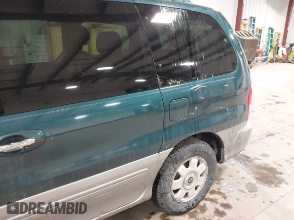 2003 Kia Sedona LX with VIN KNDUP131336390410, listed as a IAAI auction lot 41602426 with 170,613 mi miles. Bid and sale history available at carsss.com. Image 6.
