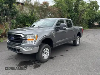2021 Ford F-150 XL with VIN 1FTFW1E86MKD57397, listed as a Copart auction lot 62959355 with 59,227 mi miles and Salvage title. Bid and sale history available at DreamBid. Image 2.