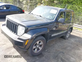 2008 Jeep Liberty Sport with VIN 1J8GP28KX8W227953, listed as a IAAI auction lot 42049588 with 310,901 mi miles. Bid and sale history available at carsss.com. Image 2.