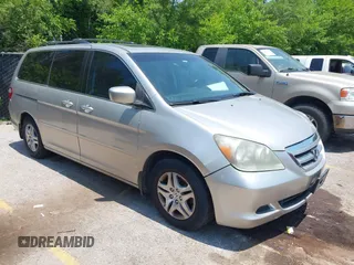 2007 Honda Odyssey EX-L z VIN 5FNRL38737B088877, wystawiony jako IAAI lot #42463701 z przebiegiem 192 427 mil mil oraz . Historia ofert i sprzedaży dostępna na DreamBid. Obrazek 1.