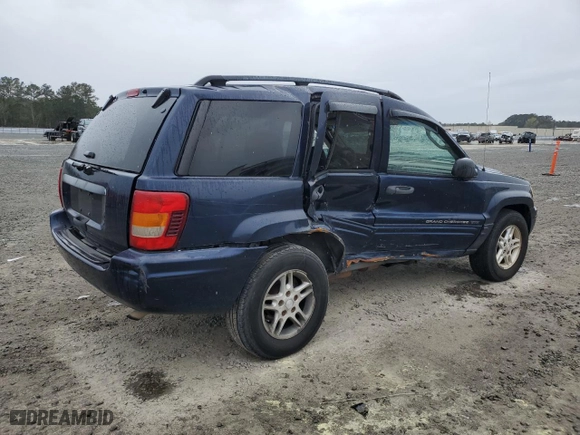 2004 Jeep Grand Cherokee Laredo with VIN 1J4GX48S64C165105, listed as a Copart auction lot 50301455 with 299,686 mi miles and Salvage Title. Bid and sale history available at carsss.com. Image 3.