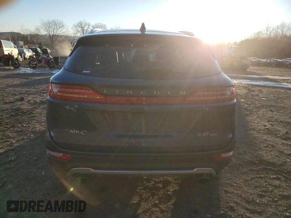 2018 Lincoln MKC Reserve with VIN 5LMTJ3DH3JUL11839, listed as a Copart auction lot 84508744 with 86,685 mi miles and Salvage Title. Bid and sale history available at DreamBid. Image 6.