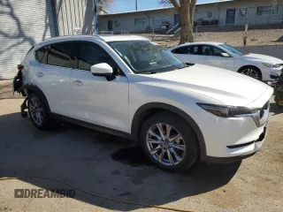 2019 Mazda CX-5 Grand Touring with VIN JM3KFADM4K1674408, listed as a Copart auction lot 47684015 with 77,554 mi miles and Salvage Title. Bid and sale history available at carsss.com. Image 4.