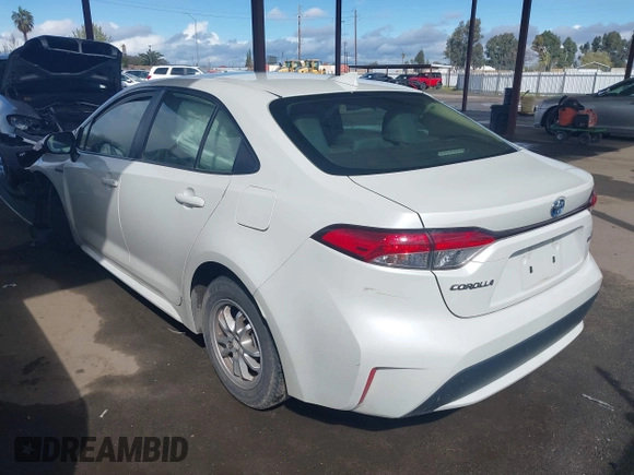 2021 Toyota Corolla Hybrid LE with VIN JTDEAMDE7MJ012694, listed as a IAAI auction lot 41794233 with 103,363 mi miles. Bid and sale history available at carsss.com. Image 3.