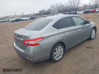 2014 Nissan Sentra SR with VIN 3N1AB7AP4EL634198, listed as a IAAI auction lot 42013632 with 209,145 mi miles. Bid and sale history available at carsss.com. Image 4.