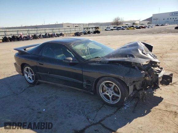 2001 Pontiac Firebird Formula with VIN 2G2FV22GX12107045, listed as a Copart auction lot 88646235 with 165,488 mi miles and Salvage title. Bid and sale history available at DreamBid. Image 4.