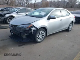 2018 Toyota Corolla L z VIN 5YFBURHE2JP831394, wystawiony jako IAAI lot #41689172 z przebiegiem 74 985 mil mil oraz . Historia ofert i sprzedaży dostępna na DreamBid. Obrazek 17.