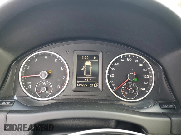 2013 Volkswagen Tiguan SE z VIN WVGBV7AXXDW534779, wystawiony jako Copart lot #77397164 z przebiegiem 149 285 mil mil oraz Szkoda całkowita • Salvage title. Historia ofert i sprzedaży dostępna na DreamBid. Obrazek 9.