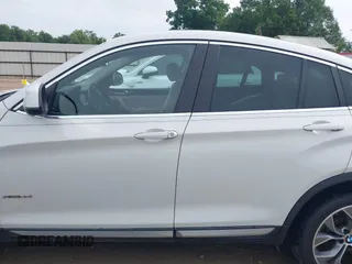 2015 BMW X4 xDrive28i with VIN 5UXXW3C51F0M86668, listed as a IAAI auction lot 42489071 with 59,694 mi miles and . Bid and sale history available at DreamBid. Image 15.