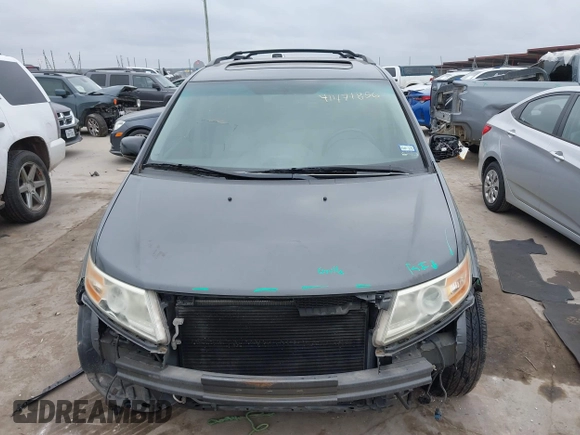 2012 Honda Odyssey Touring with VIN 5FNRL5H96CB138548, listed as a IAAI auction lot 41471856 with 186,284 mi miles and . Bid and sale history available at DreamBid. Image 13.
