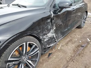 2019 Volvo S60 R-Design with VIN 7JRA22TM9KG014922, listed as a IAAI auction lot 41826883 with 97,702 mi miles. Bid and sale history available at carsss.com. Image 12.