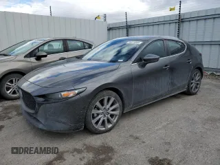 2021 Mazda Mazda3 Hatchback Preferred with VIN JM1BPBLL5M1344378, listed as a Copart auction lot 79411844 with 74,371 mi miles and Salvage Title. Bid and sale history available at carsss.com. Image 1.