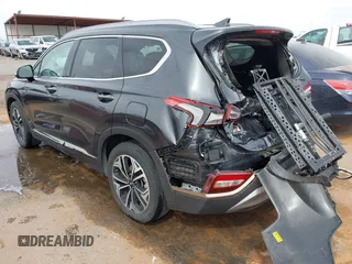 2020 Hyundai Santa Fe Limited with VIN 5NMS53AA8LH213608, listed as a IAAI auction lot 41787079 with 53,634 mi miles and . Bid and sale history available at DreamBid. Image 3.