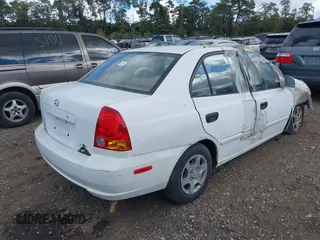 2004 Hyundai Accent GL z VIN KMHCG45C24U559935, wystawiony jako IAAI lot #40487927 z przebiegiem Nie podano mil oraz . Historia ofert i sprzedaży dostępna na DreamBid. Obrazek 4.