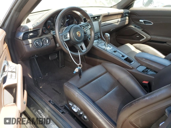 2019 Porsche 911 4S with VIN WP0BB2A99KS126019, listed as a Copart auction lot 60111334 with 25,012 mi miles and Salvage Title. Bid and sale history available at DreamBid. Image 8.