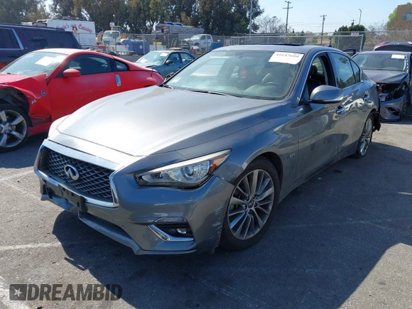 2019 Infiniti Q50 Luxe with VIN JN1EV7APXKM511385, listed as a IAAI auction lot 41647699 with 34,489 mi miles and . Bid and sale history available at DreamBid. Image 2.