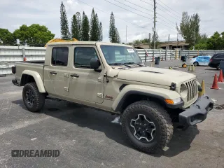 2022 Jeep Gladiator Rubicon с VIN 1C6JJTBG2NL171598, выставлен на аукционе Copart как лот 59494925 с пробегом 46 097 миль миль и Списание • Salvage title. История ставок и продаж доступна на DreamBid. Изображение 4.