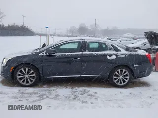 2013 Cadillac XTS with VIN 2G61N5S37D9112979, listed as a IAAI auction lot 41209826 with 83,237 mi miles. Bid and sale history available at carsss.com. Image 14.