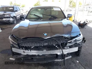 2022 BMW 3 Series 330i with VIN 3MW5R1J08N8C55960, listed as a IAAI auction lot 42505207 with Not provided miles and . Bid and sale history available at DreamBid. Image 6.