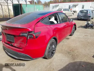 2023 Tesla Model Y Performance with VIN 7SAYGDEF6PF870935, listed as a IAAI auction lot 40718563 with 15,286 mi miles and . Bid and sale history available at DreamBid. Image 4.