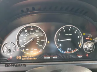 2013 BMW 6 Series 650i with VIN WBA6B2C59DDG66909, listed as a Copart auction lot 86329014 with 131,054 mi miles and Salvage Title. Bid and sale history available at DreamBid. Image 9.