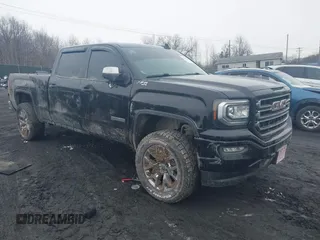 2018 GMC Sierra 1500 SLE z VIN 3GTU2MEC8JG249701, wystawiony jako IAAI lot #41556135 z przebiegiem 87 657 mil mil oraz . Historia ofert i sprzedaży dostępna na DreamBid. Obrazek 1.