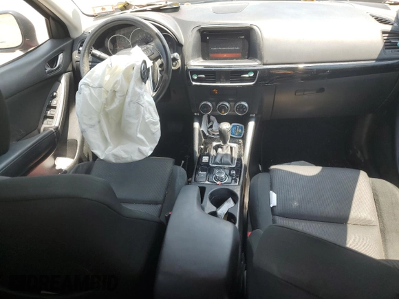 2016 Mazda CX-5 Sport with VIN JM3KE4BY3G0765905, listed as a Copart auction lot 61874165 with 134,546 mi miles and Salvage title. Bid and sale history available at DreamBid. Image 8.