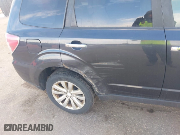 2011 Subaru Forester 2.5X Premium with VIN JF2SHBCC6BH705538, listed as a IAAI auction lot 41439382 with 214,376 mi miles. Bid and sale history available at carsss.com. Image 6.