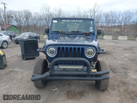 2004 Jeep Wrangler X with VIN 1J4FA39S64P780915, listed as a IAAI auction lot 42035524 with 131,057 mi miles and . Bid and sale history available at DreamBid. Image 12.