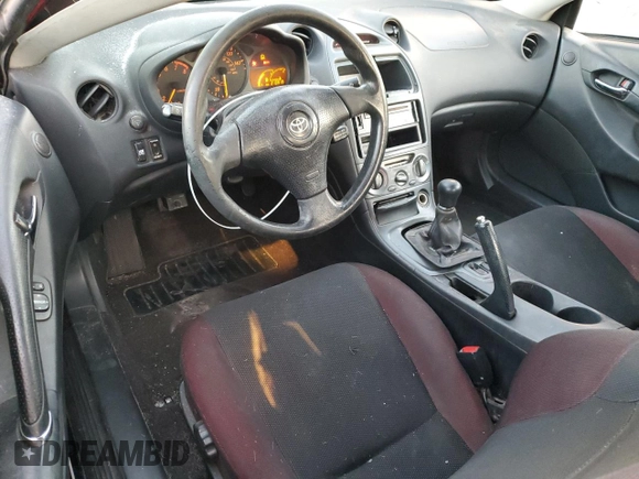 2004 Toyota Celica GT with VIN JTDDR32T040168744, listed as a Copart auction lot 85504754 with 210,919 mi miles and Clean Title. Bid and sale history available at DreamBid. Image 8.