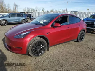 2024 Tesla Model Y Long Range with VIN 7SAYGAEEXRF056411, listed as a Copart auction lot 89218715 with Not Provided miles and Salvage Title. Bid and sale history available at DreamBid. Image 1.