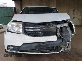 2014 Honda Pilot EX-L with VIN 5FNYF4H59EB047609, listed as a IAAI auction lot 42071353 with 148,661 mi miles and . Bid and sale history available at carsss.com. Image 11.