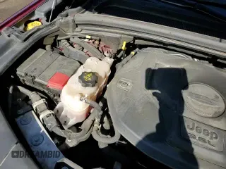 2021 Jeep Grand Cherokee Overland with VIN 1C4RJKDG2M8120090, listed as a Copart auction lot 64034225 with 52,707 mi miles and Salvage title. Bid and sale history available at DreamBid. Image 16.