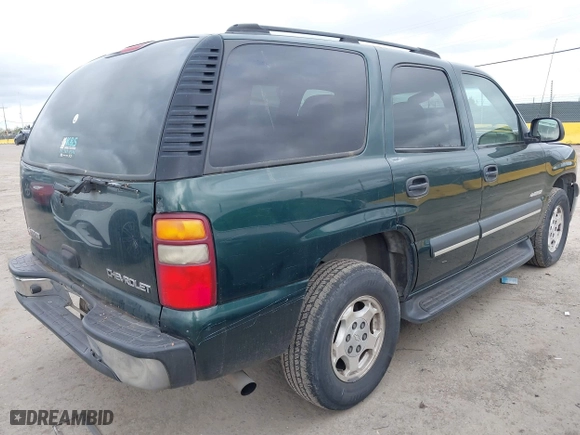2003 Chevrolet Tahoe LS with VIN 1GNEC13V13J250718, listed as a IAAI auction lot 41981819 with 303,969 mi miles. Bid and sale history available at carsss.com. Image 4.