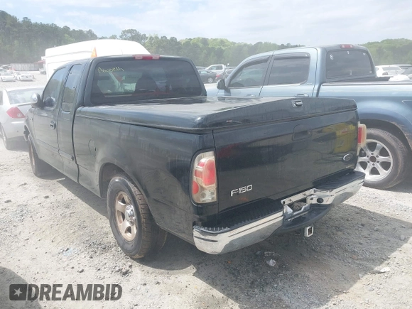 2000 Ford F-150 XL with VIN 1FTZX1723YNB84512, listed as a IAAI auction lot 41966003 with 1 mi miles. Bid and sale history available at carsss.com. Image 3.